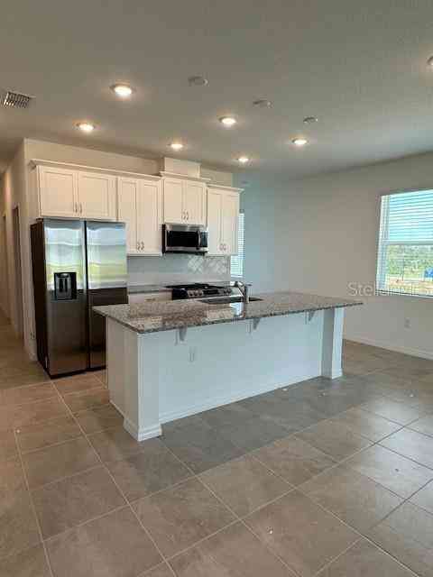 6716 Golden Eagle Boulevard, HOWEY IN THE HILLS, Florida image 3