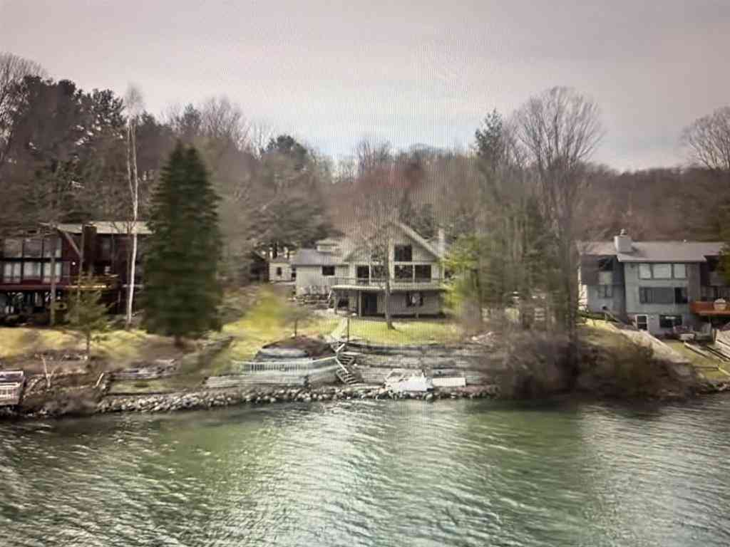 Homes For Sale - 2447 N West Torch Lake Drive <br/> Kewadin, MI 49648