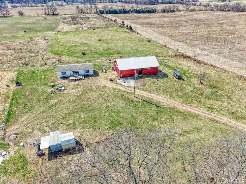 Homes For Sale - 12459 Earl Road <br/> Stockbridge, MI 49285