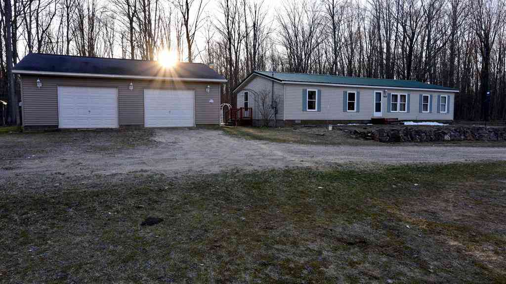 Homes For Sale - 9122 Grimm Lane <br/> Mancelona, MI 49659