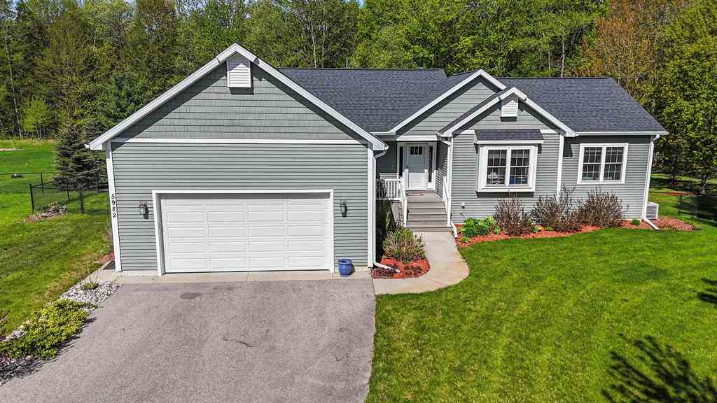 Homes For Sale - 5982 Village Drive <br/> Traverse City, MI 49685