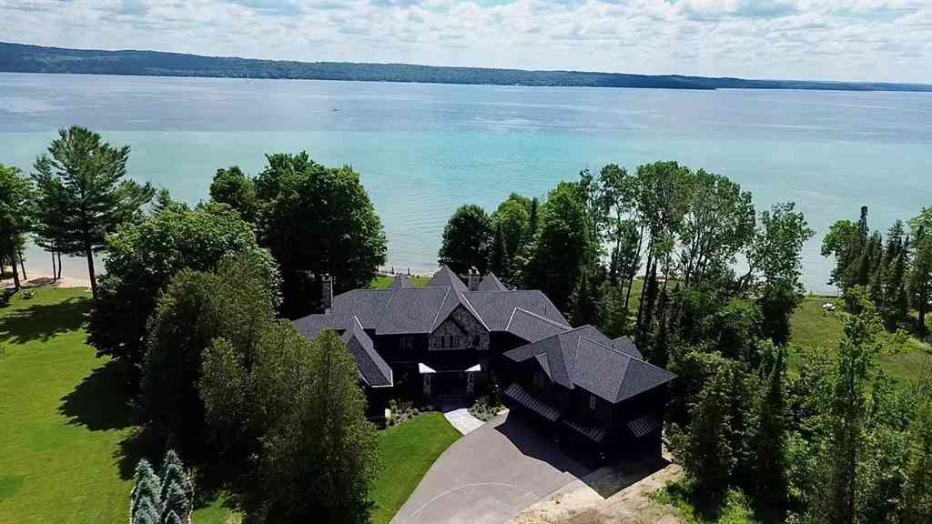 Homes For Sale - 607 NW Torch Lake Drive <br/> Kewadin, MI 49648