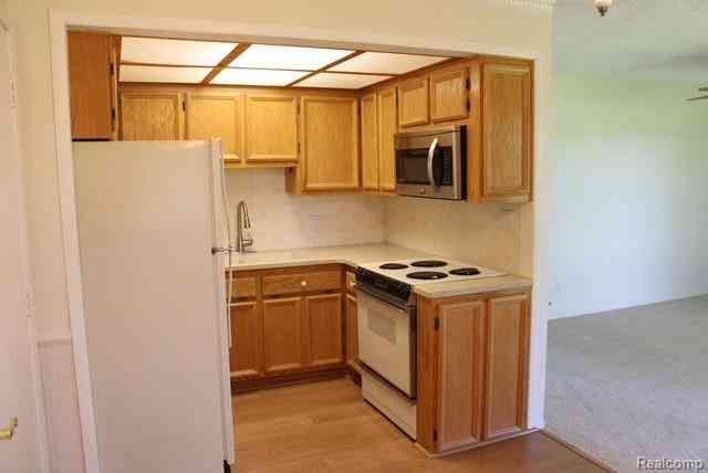 Condo For Sale - 27094 Sandy Hill Ln   #24<br/> New Hudson, MI 48165