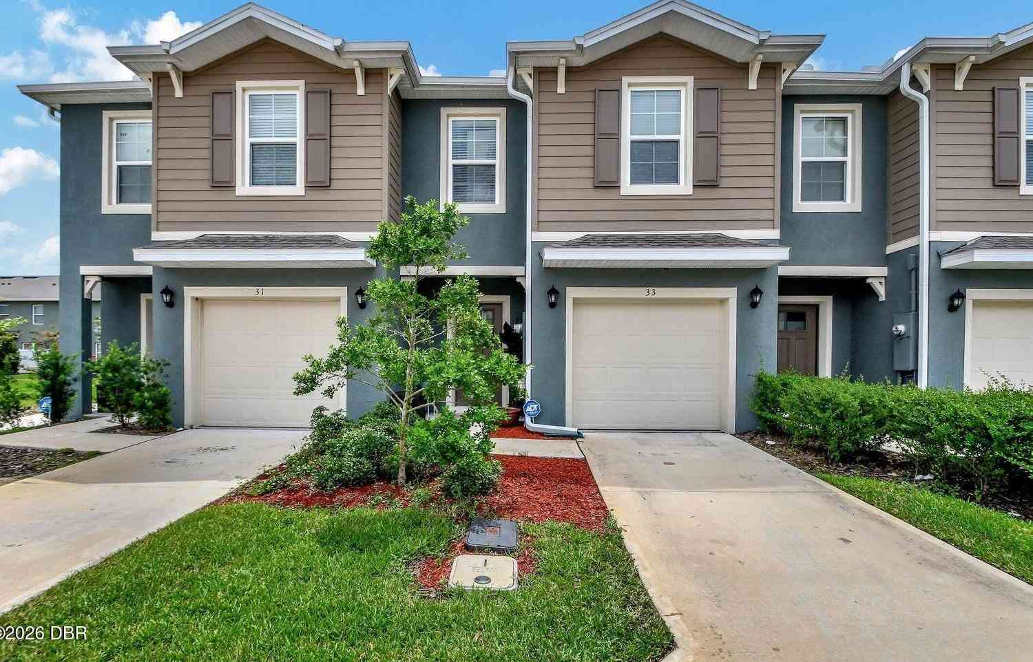 Townhouse For Sale - 33 E Bella Lago Circle<br/> Port Orange, FL 32129