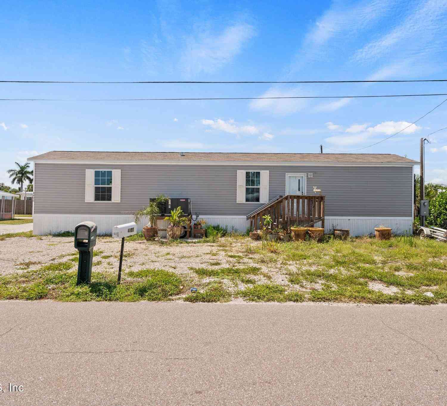 Mobile Home For Sale - 4895 Flamingo Drive<br/> St. James City, FL 33956