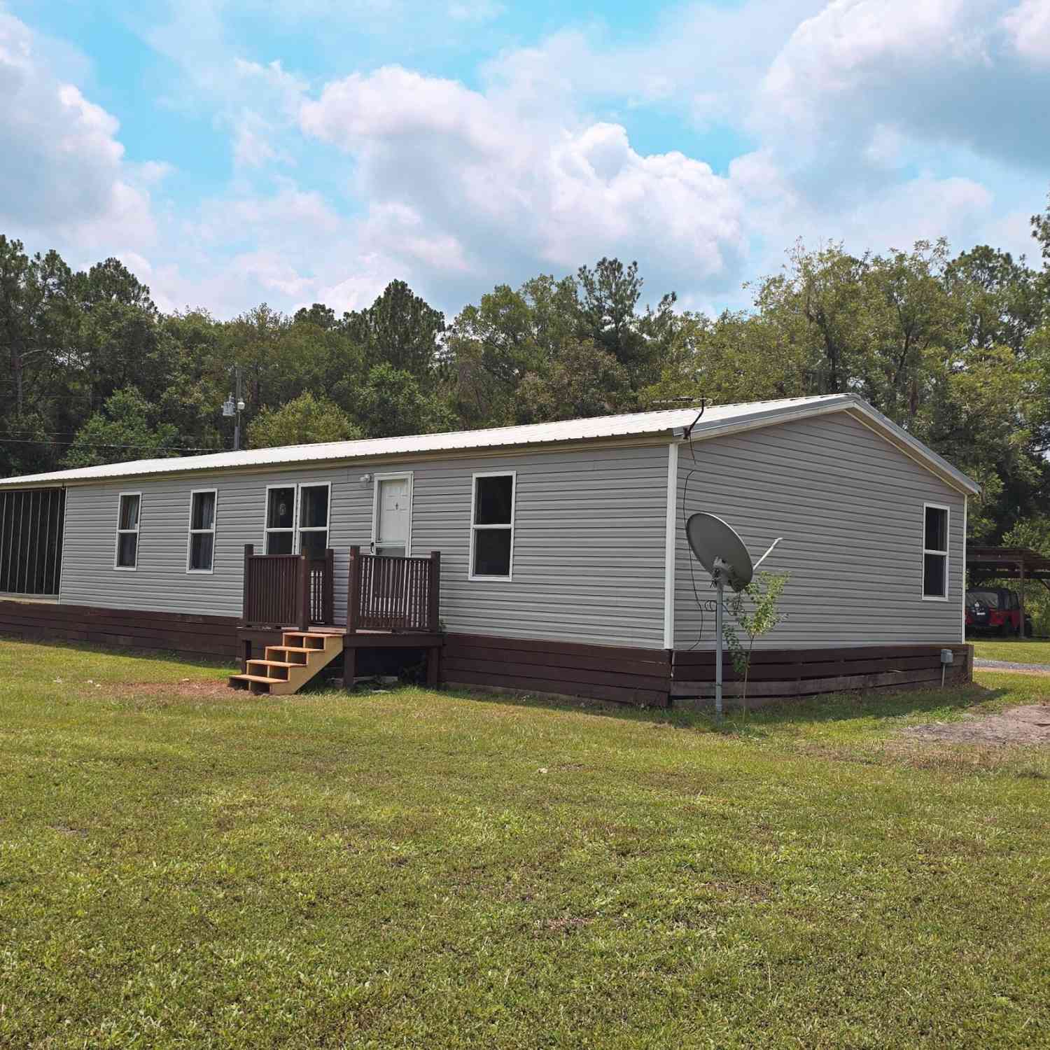 Mobile Home For Sale - 20331 NW 71st Place<br/> Starke, FL 32091
