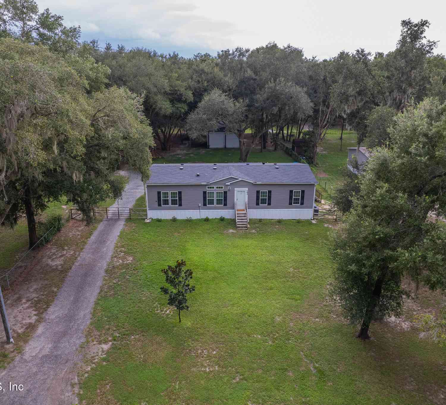 Mobile Home For Sale - 143 Little Orange Lake Drive<br/> Putnam County, Heathrow, FL 32640