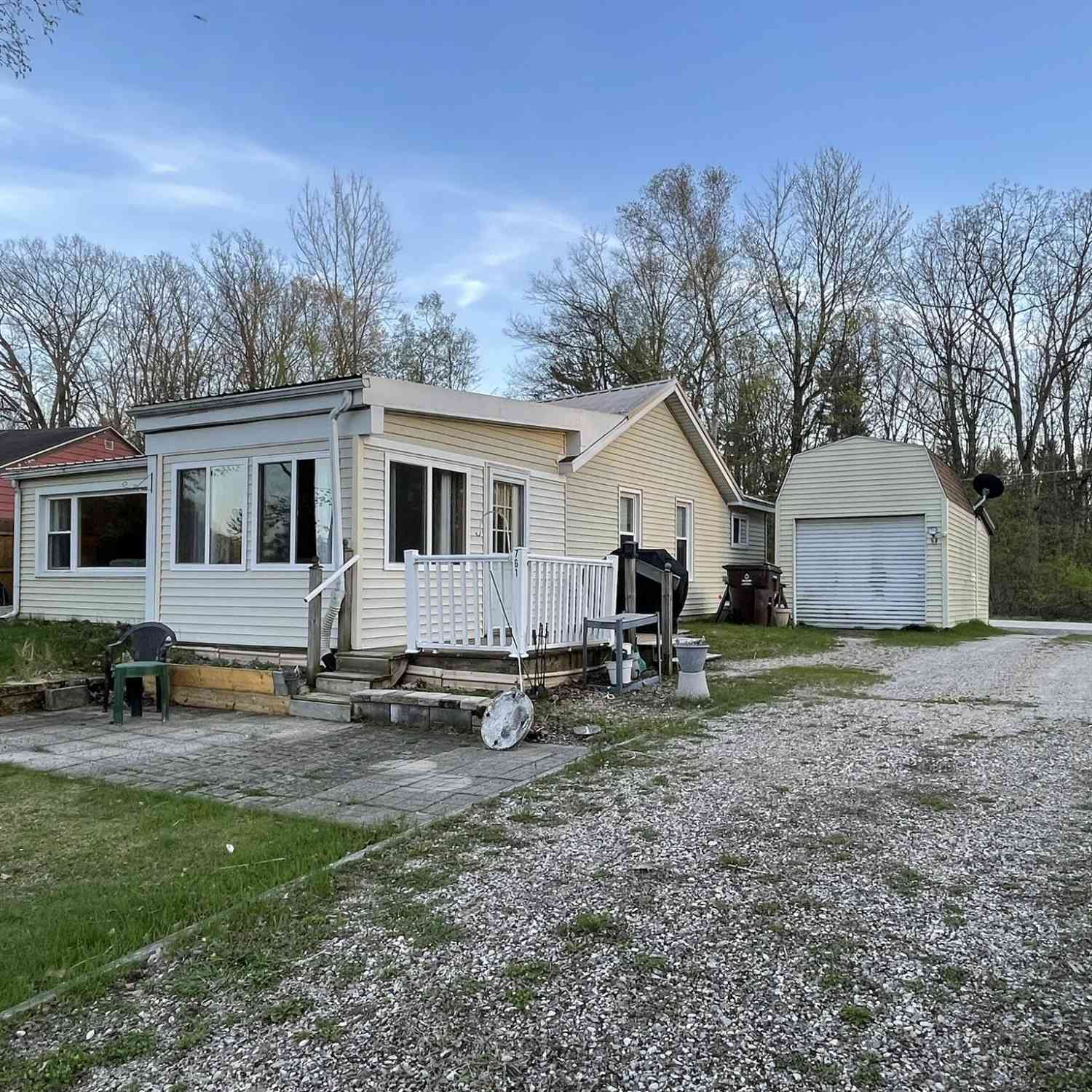 Homes For Sale - 761 S Coolidge Drive<br/> Six Lakes, MI 48886