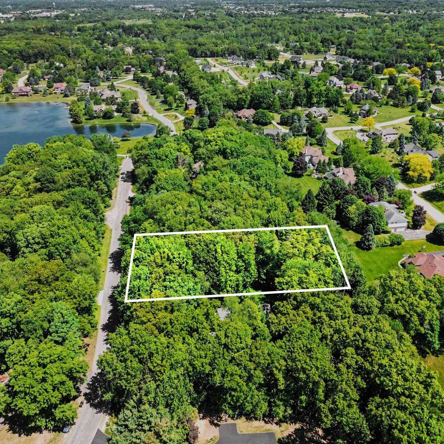 Vacant Land For Sale - 9425 Whispering Pines Drive<br/> Saline, MI 48176
