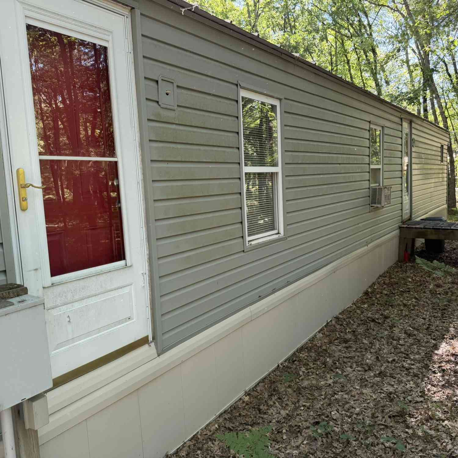 Mobile Home For Sale - 7363 Riverside Drive<br/> Manistee, MI 49660