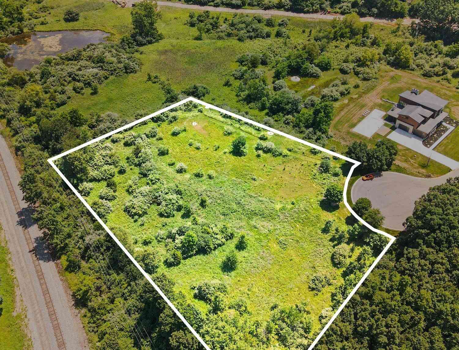 Vacant Land For Sale - 6894 Bridgewood Hills Drive<br/> Washtenaw County, Dexter, MI 48130