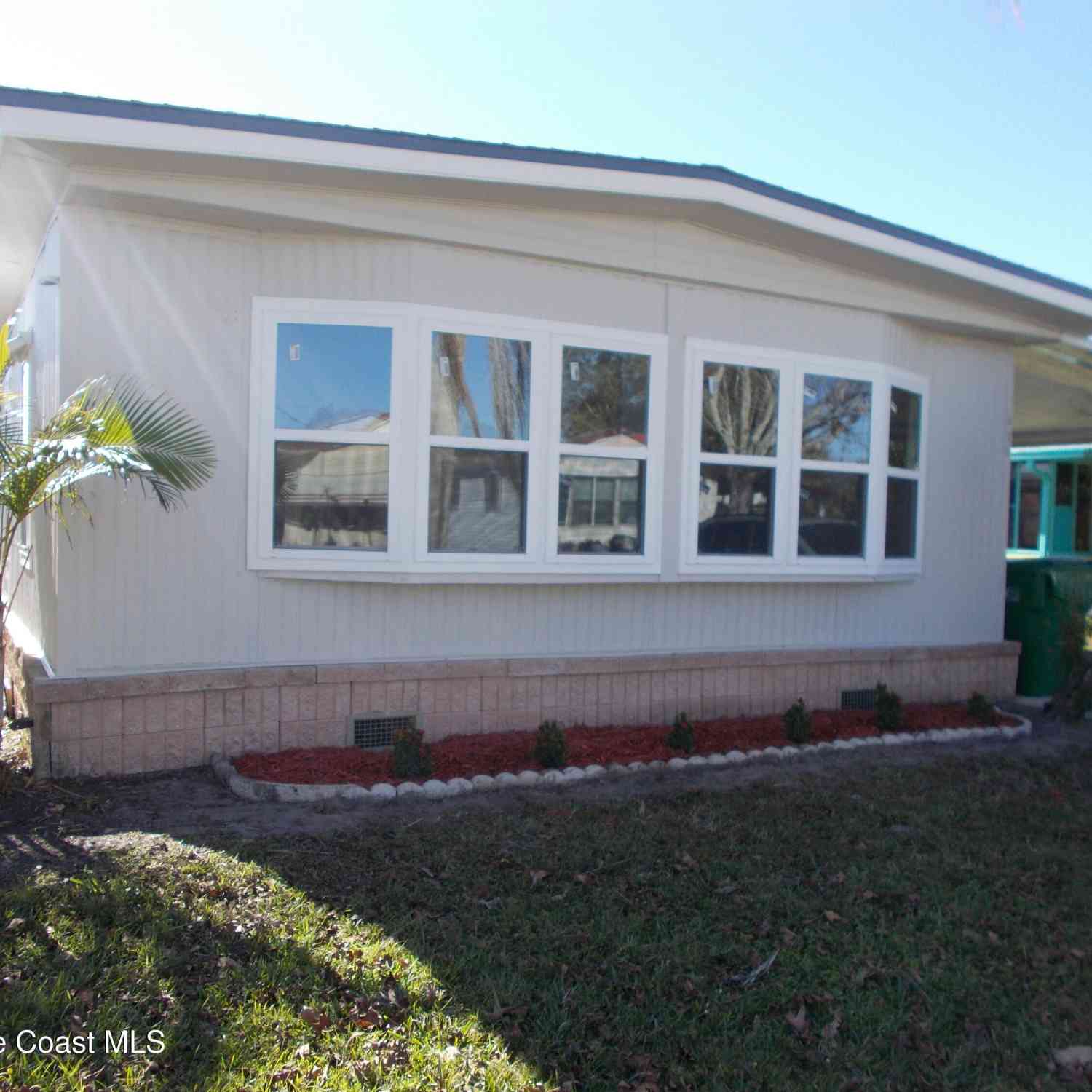 Condo For Sale - 619 Sea Gull Drive<br/> Barefoot Bay, FL 32976