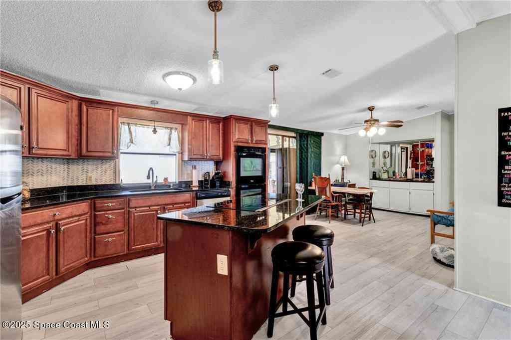 Condo For Sale - 729 Gladiolus Drive<br/> Barefoot Bay, FL 32976