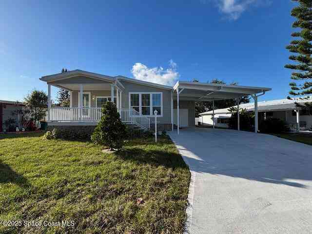 Condo For Sale - 723 Hyacinth Circle<br/> Barefoot Bay, FL 32976