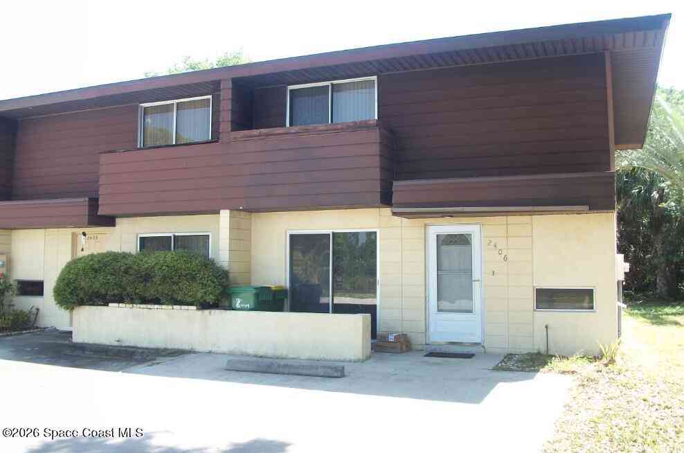 Townhouse For Sale - 2406 N Tropical Trail<br/> Merritt Island, FL 32953