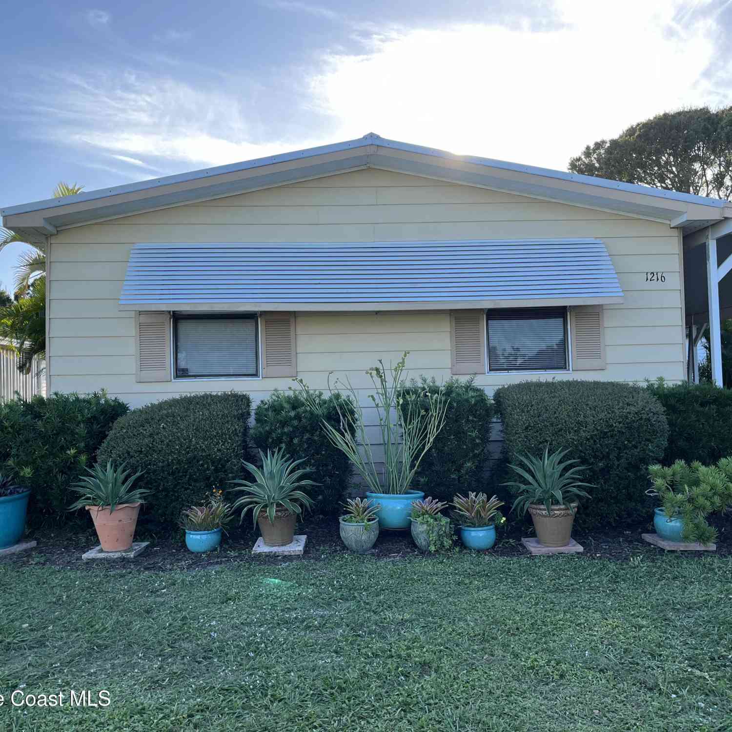 Mobile Home For Sale - 1216 Gardenia Drive<br/> Barefoot Bay, FL 32976