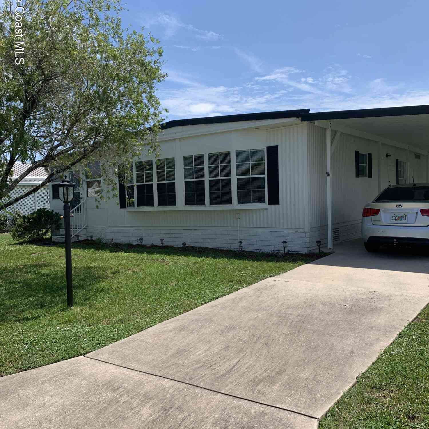 Homes For Sale - 913 Fir Street<br/> Barefoot Bay, FL 32976