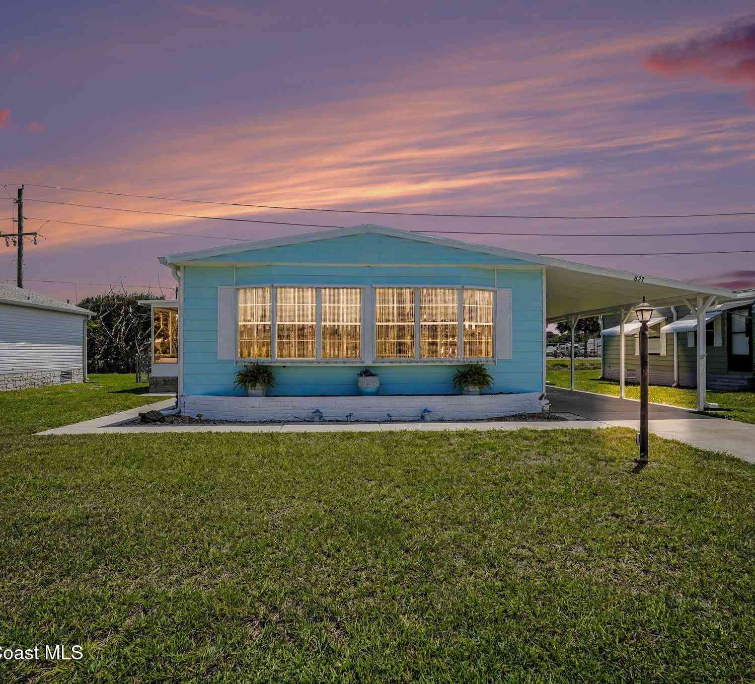Mobile Home For Sale - 823 Vireo Drive<br/> Barefoot Bay, FL 32976