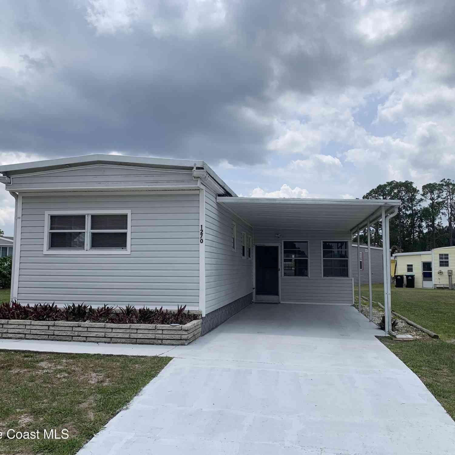 Mobile Home For Sale - 1270 Dove Court<br/> Palm Bay, FL 32907