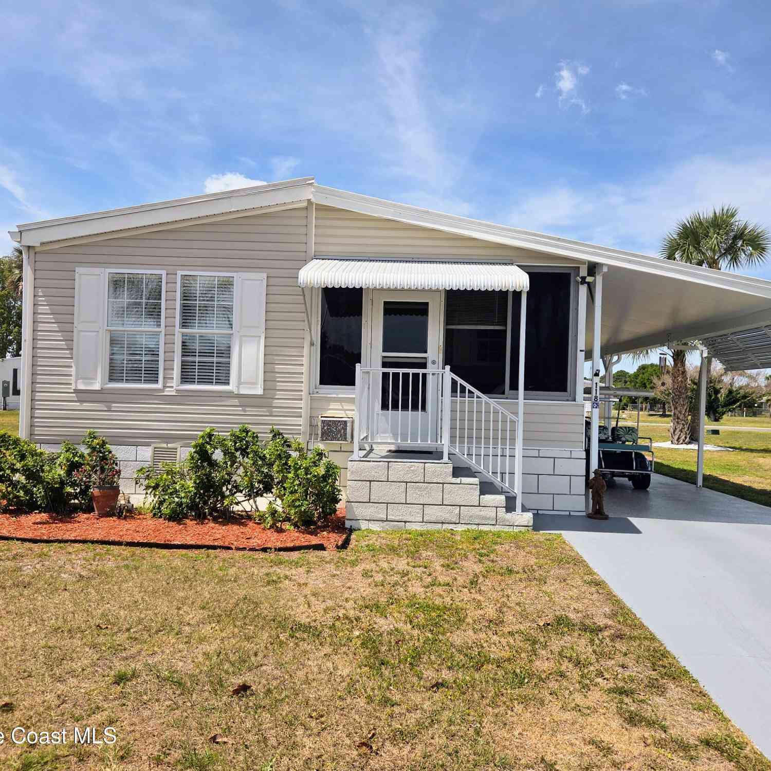 Mobile Home For Sale - 118 Holiday Park Boulevard<br/> Palm Bay, FL 32907