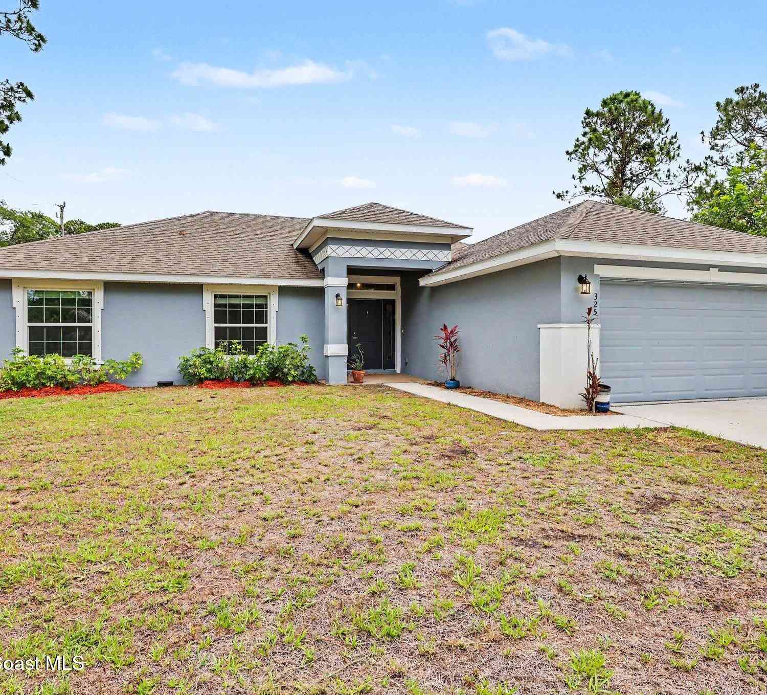 Homes For Sale - 325 Kapok Court<br/> Palm Bay, FL 32907