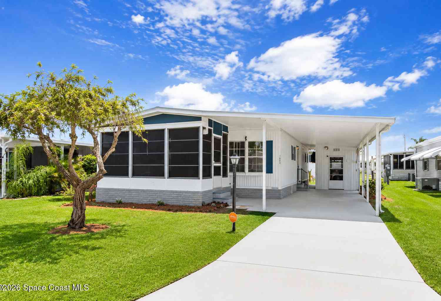 Mobile Home For Sale - 1005 Thrush Circle<br/> Barefoot Bay, FL 32976