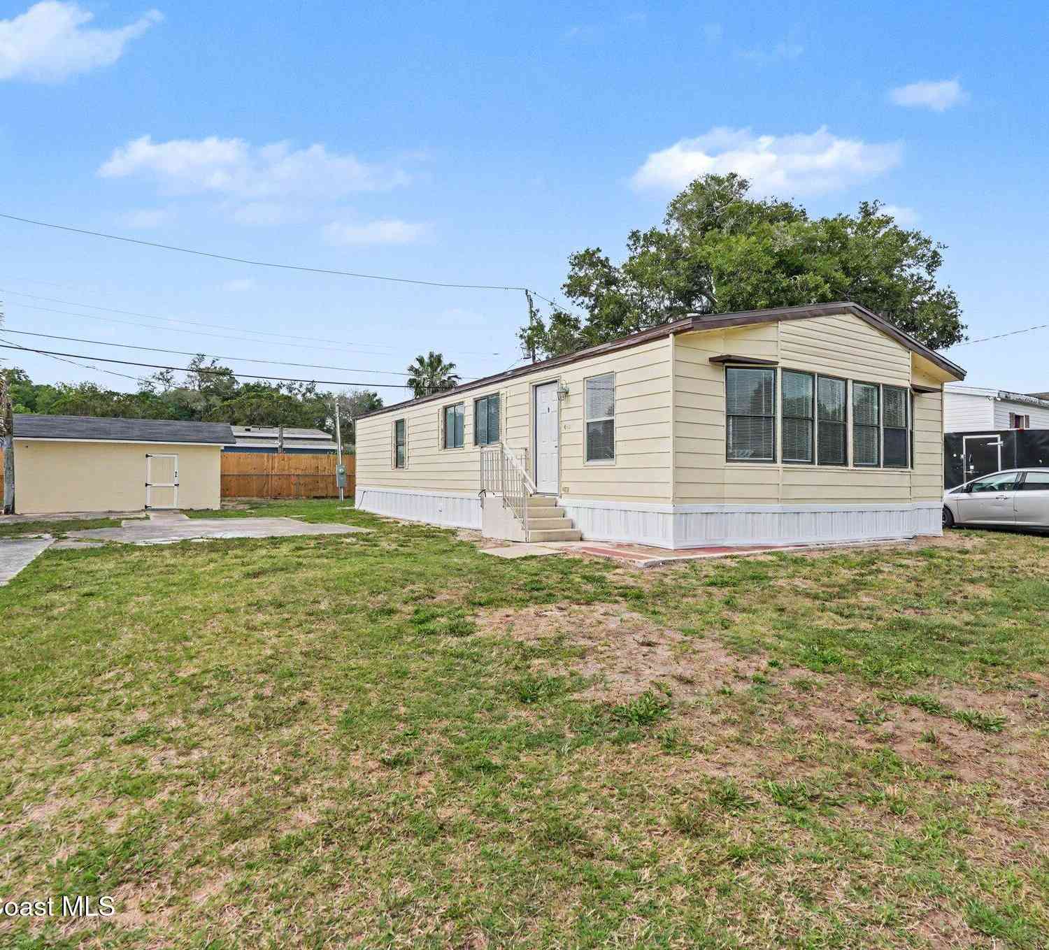 Mobile Home For Sale - 604 Breezeway Drive<br/> Cocoa, FL 32926