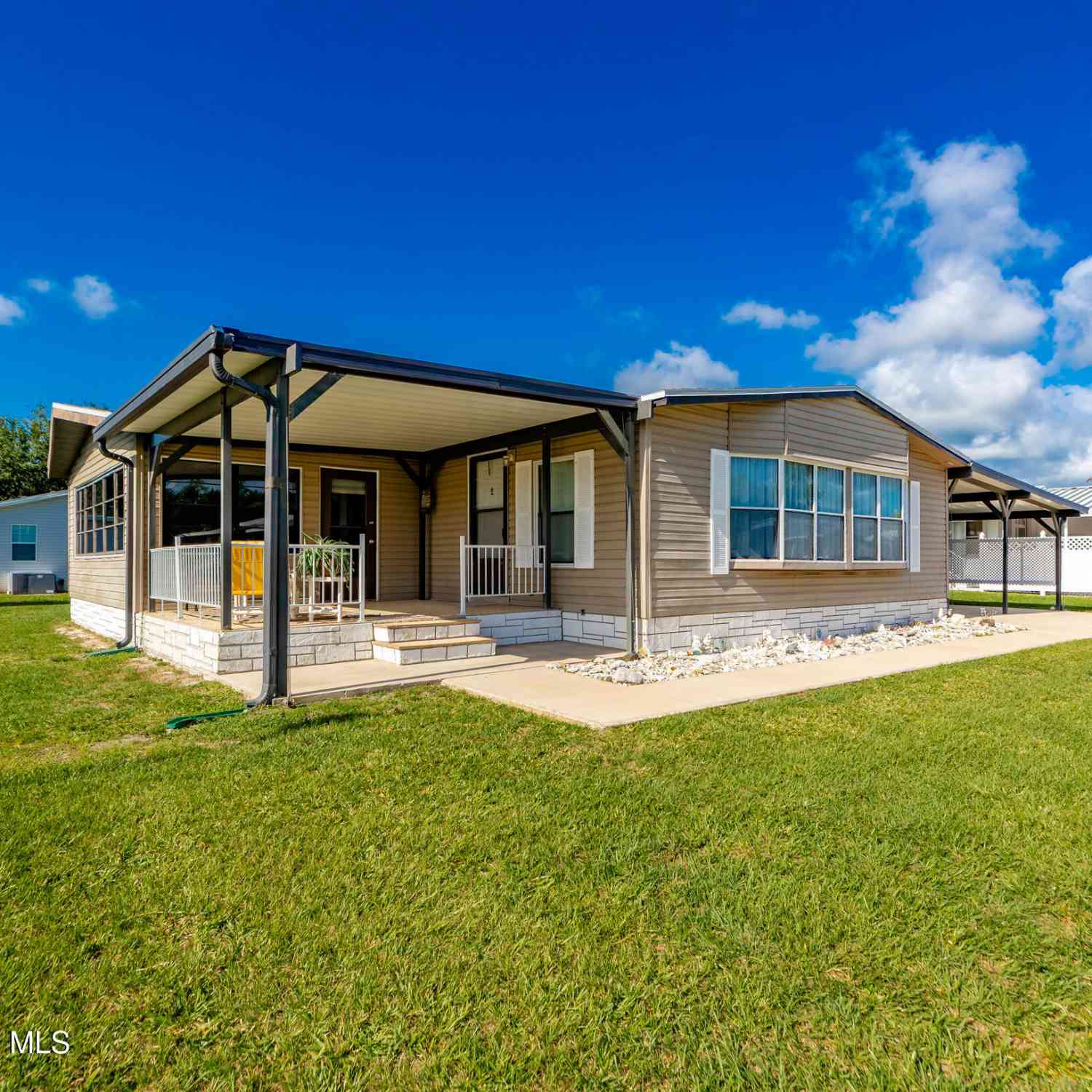 Mobile Home For Sale - 409 Macadamia Drive<br/> Micco, FL 32976
