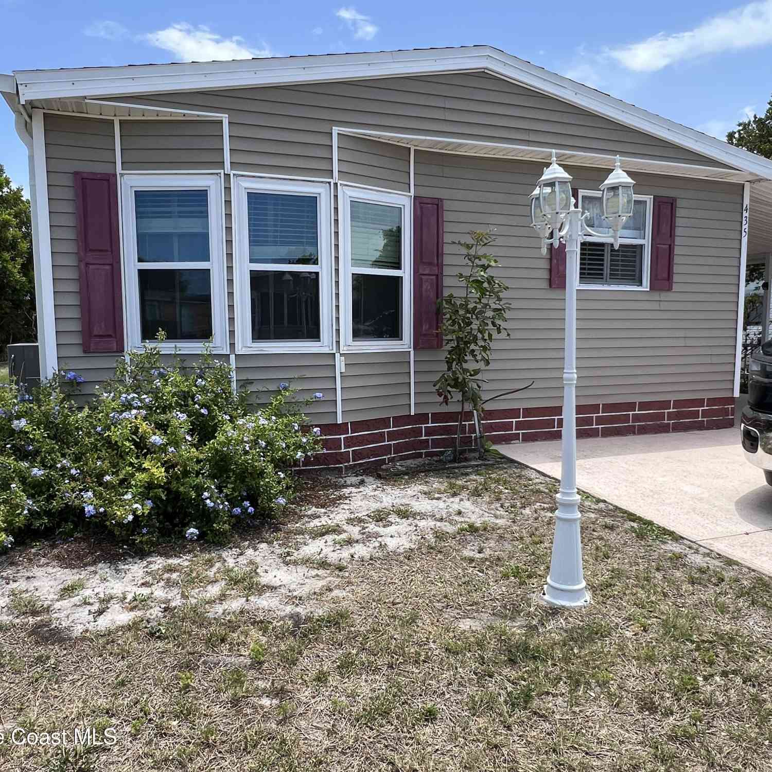 Mobile Home For Sale - 435 Seagull Drive<br/> Barefoot Bay, FL 32976