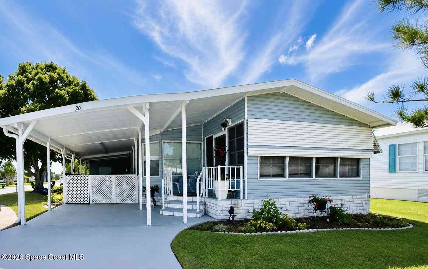 Mobile Home For Sale - 701 Gladiolus Drive<br/> Barefoot Bay, FL 32976