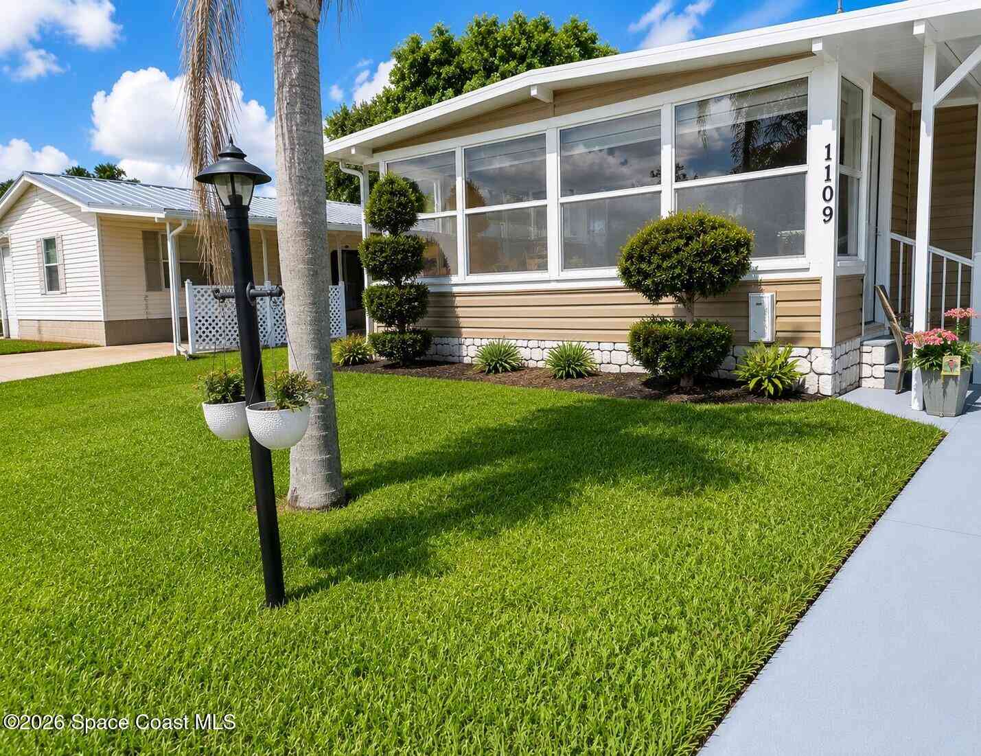 Mobile Home For Sale - 1109 Wren Circle<br/> Barefoot Bay, FL 32976