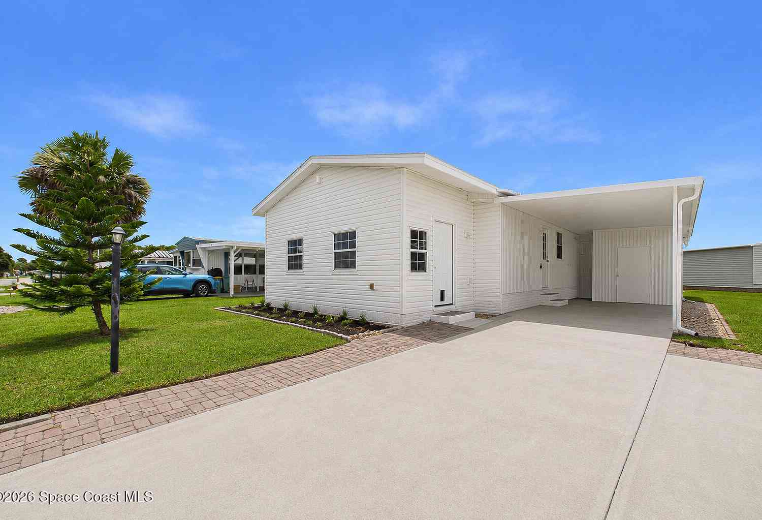 Mobile Home For Sale - 948 Cashew Circle<br/> Barefoot Bay, FL 32976