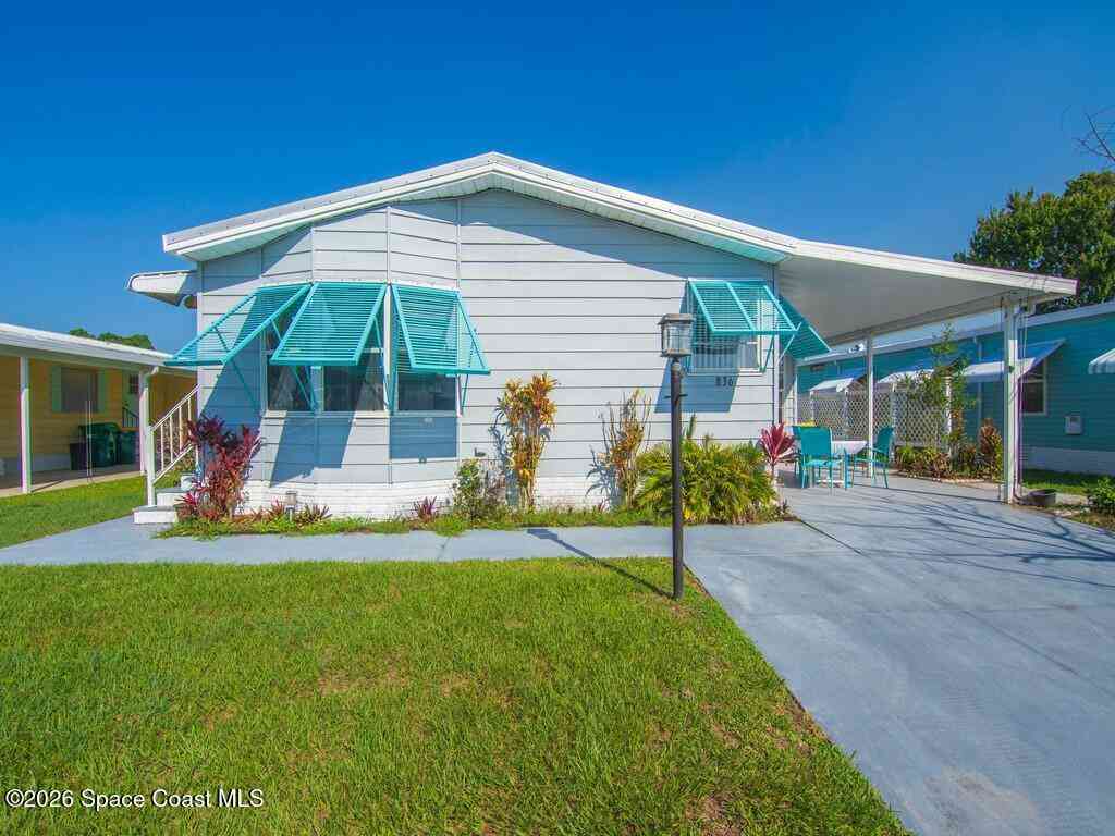 Mobile Home For Sale - 836 Hyacinth Circle<br/> Barefoot Bay, FL 32976