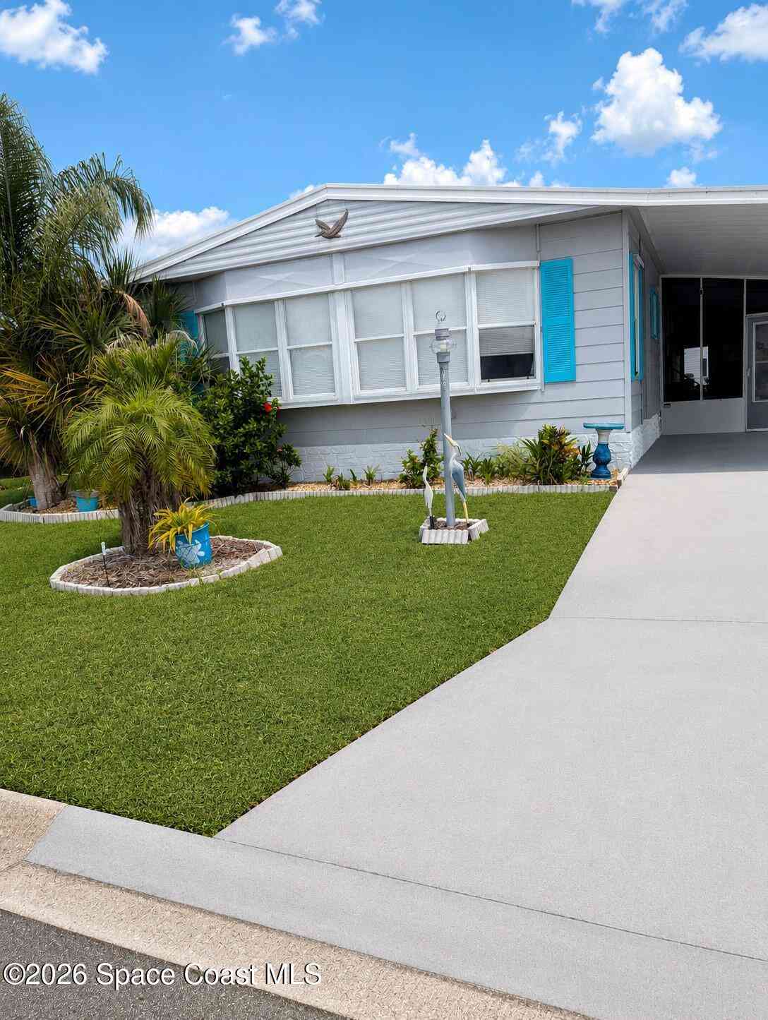Mobile Home For Sale - 520 Seagull Drive<br/> Barefoot Bay, FL 32976
