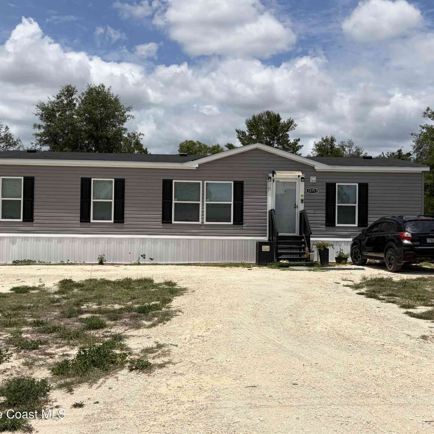 Mobile Home For Sale - 12751 NE 14th Street<br/> Williston, FL 32696