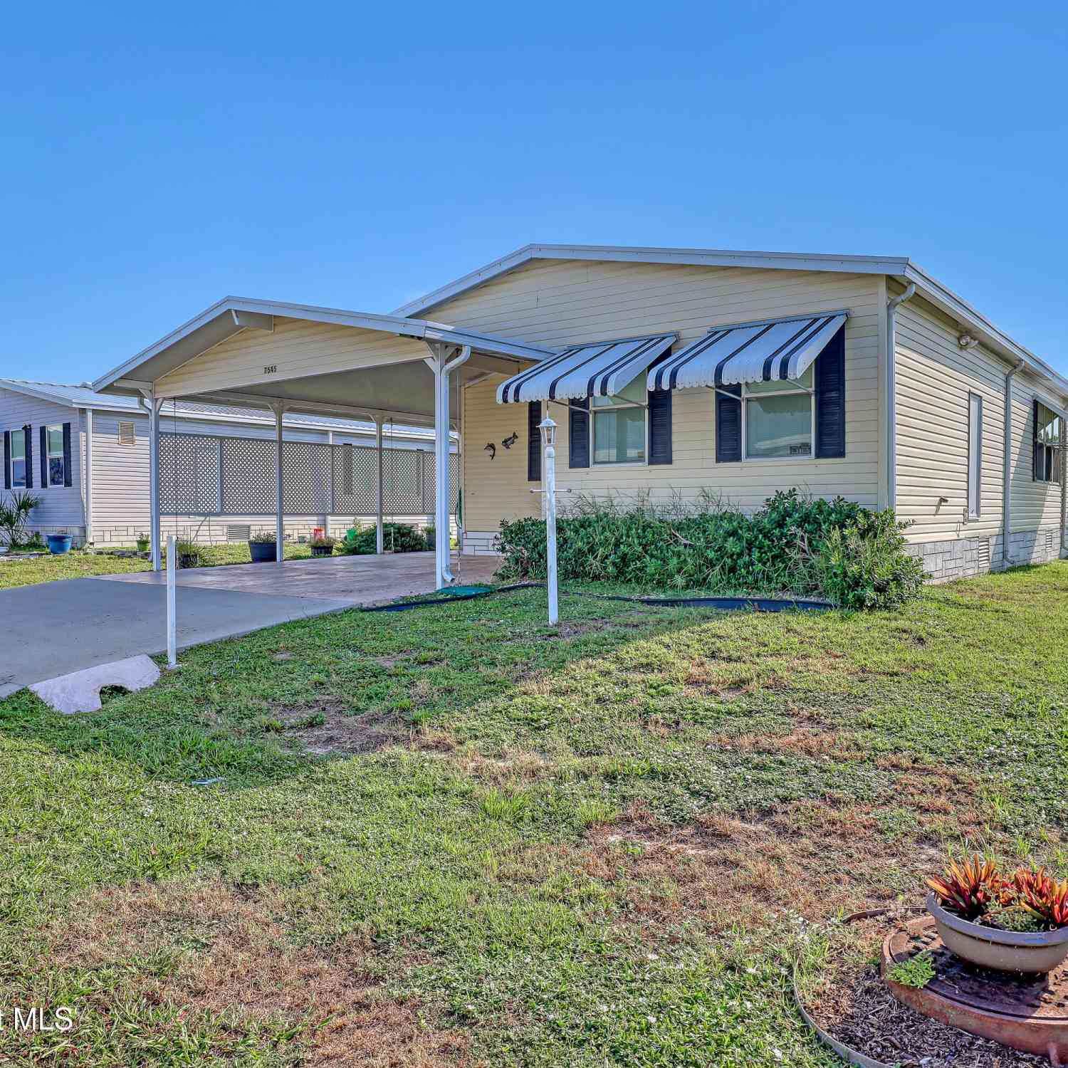 Mobile Home For Sale - 7645 Cedar Bark Road<br/> Micco, FL 32976