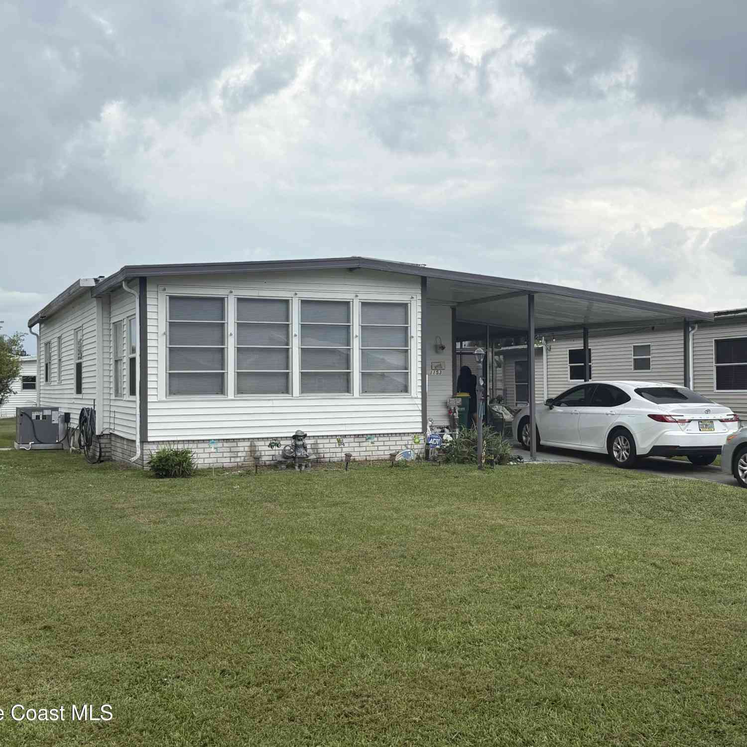 Mobile Home For Sale - 1153 Waterway Drive<br/> Brevard County, Barefoot Bay, FL 32976