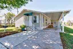 Mobile Home For Sale - 701 Lark Drive<br/> Barefoot Bay, FL 32976