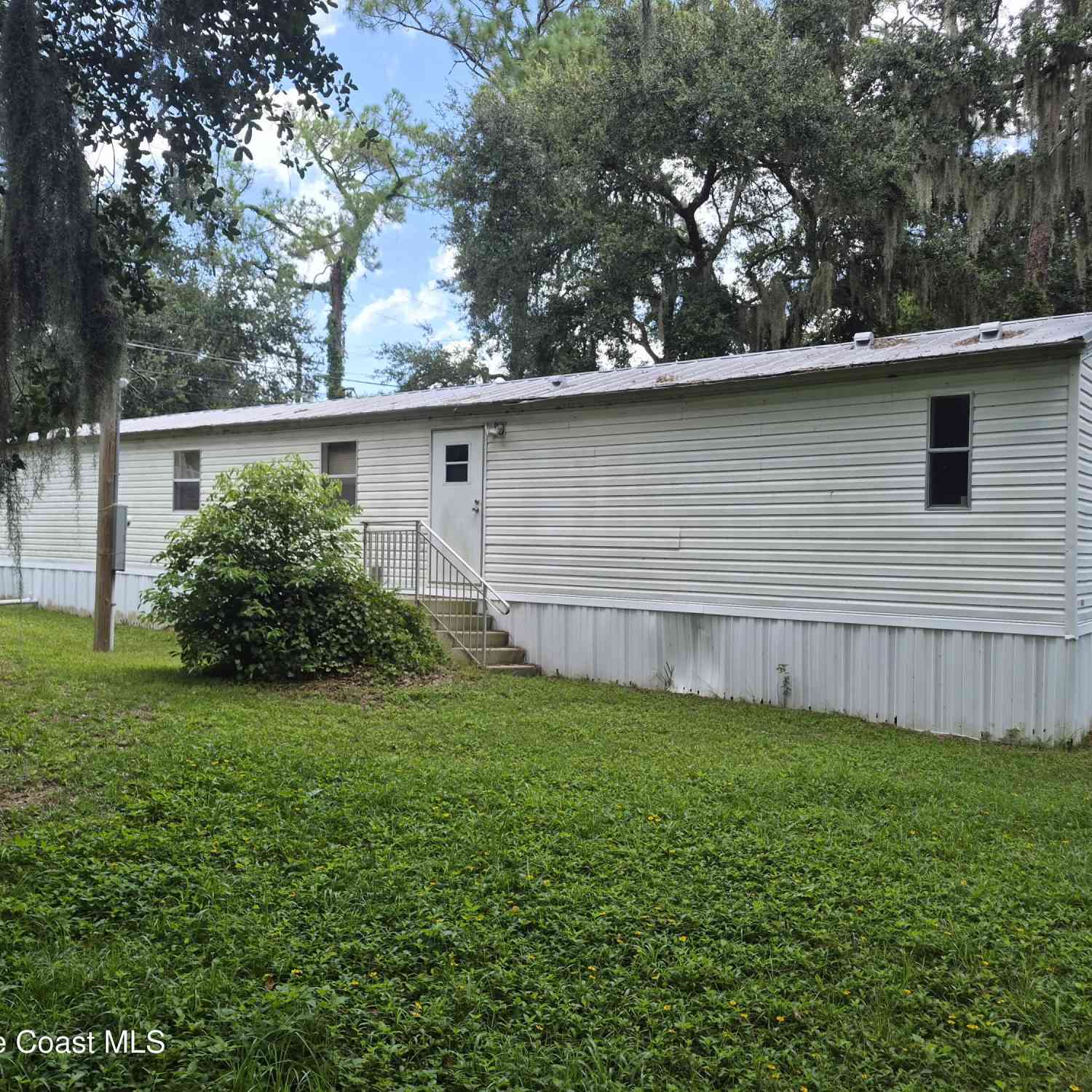 Mobile Home For Sale - 2472 Kingswood Drive<br/> Mims, FL 32754