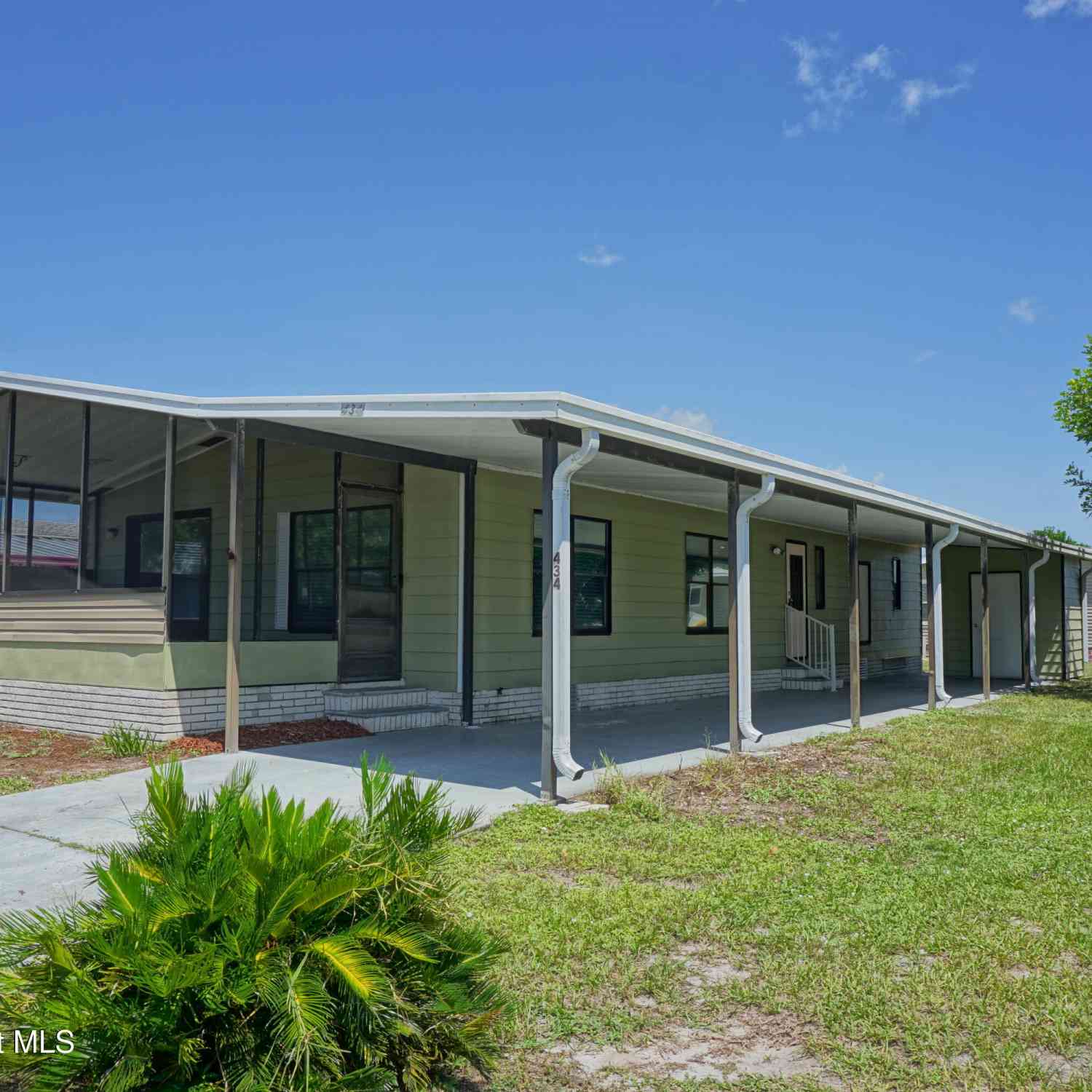 Mobile Home For Sale - 434 Royal Tern Drive<br/> Barefoot Bay, FL 32976
