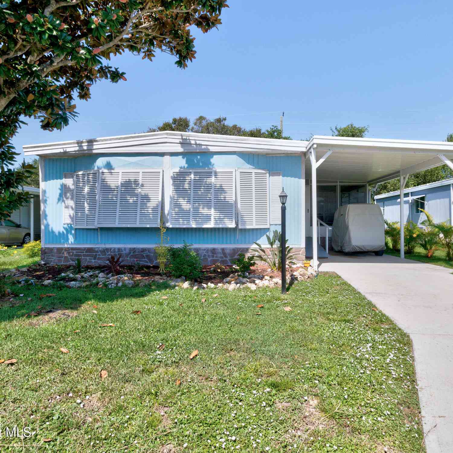 Mobile Home For Sale - 1115 Wren Circle<br/> Barefoot Bay, FL 32976