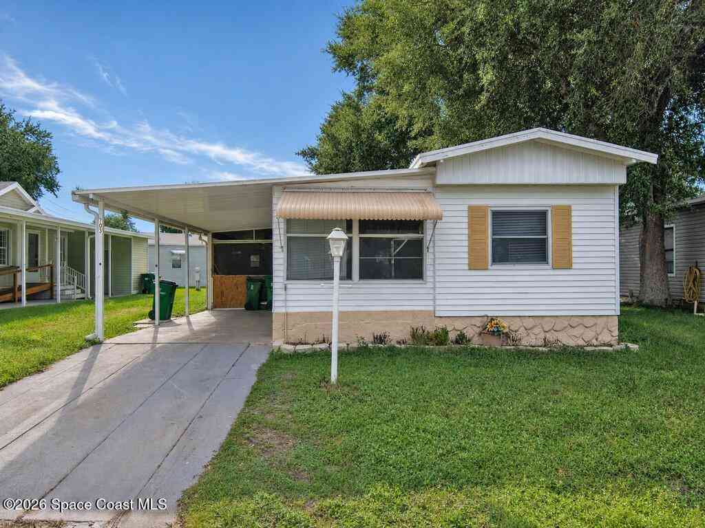 Mobile Home For Sale - 703 Lark Drive<br/> Brevard County, Barefoot Bay, FL 32976