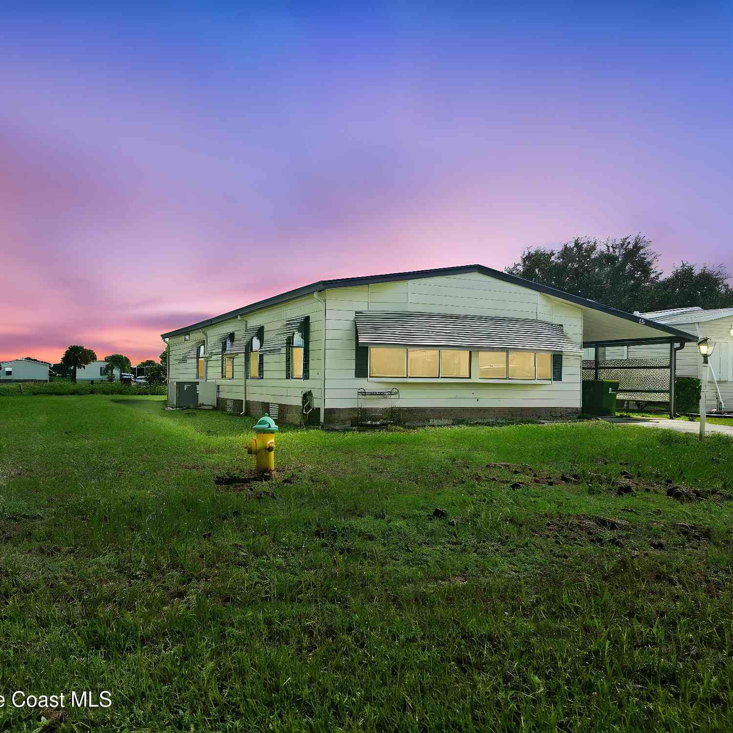 Homes For Sale - 1302 Waterway Drive<br/> Barefoot Bay, FL 32976