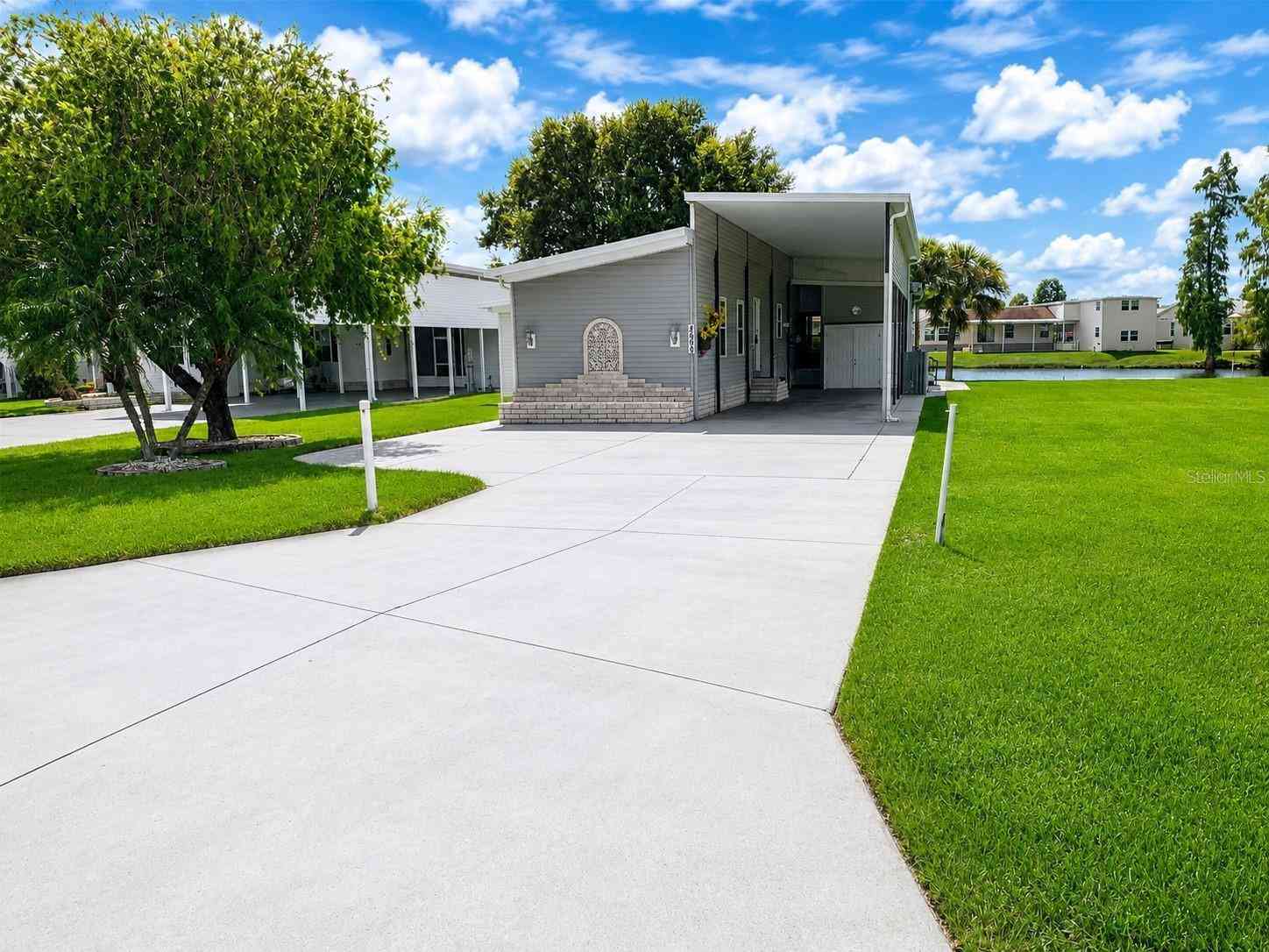 Mobile Home For Sale - 4995 Mount Olive Shores Drive<br/> POLK CITY, FL 33868
