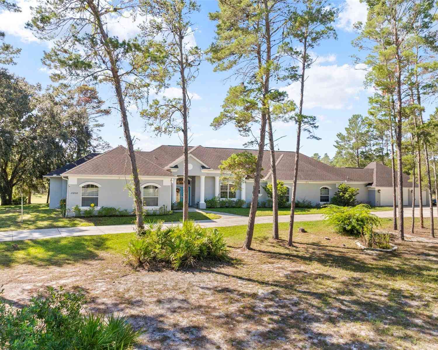 Homes For Sale - 11200 Woodland Waters Boulevard<br/> WEEKI WACHEE, FL 34613