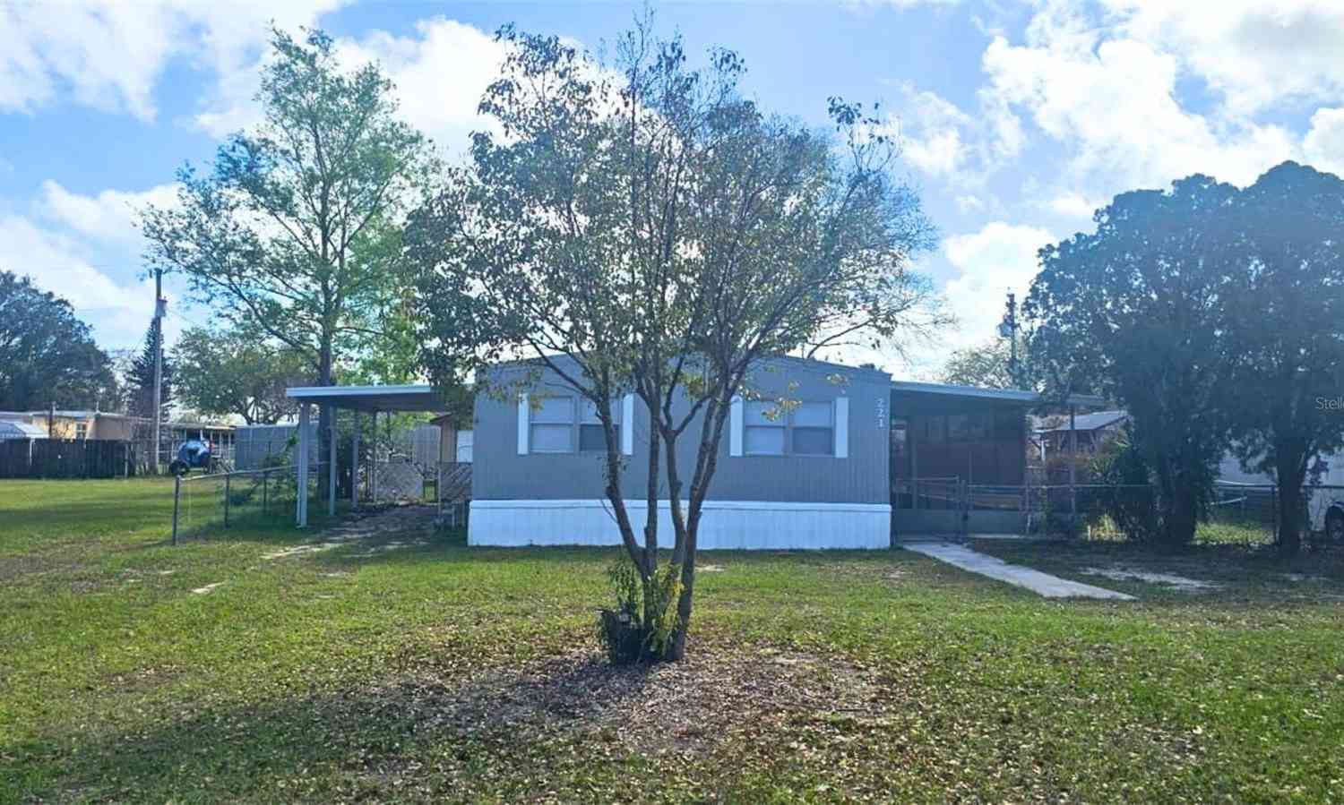 Mobile Home For Sale - 221 Sunshine Boulevard<br/> POLK CITY, FL 33868