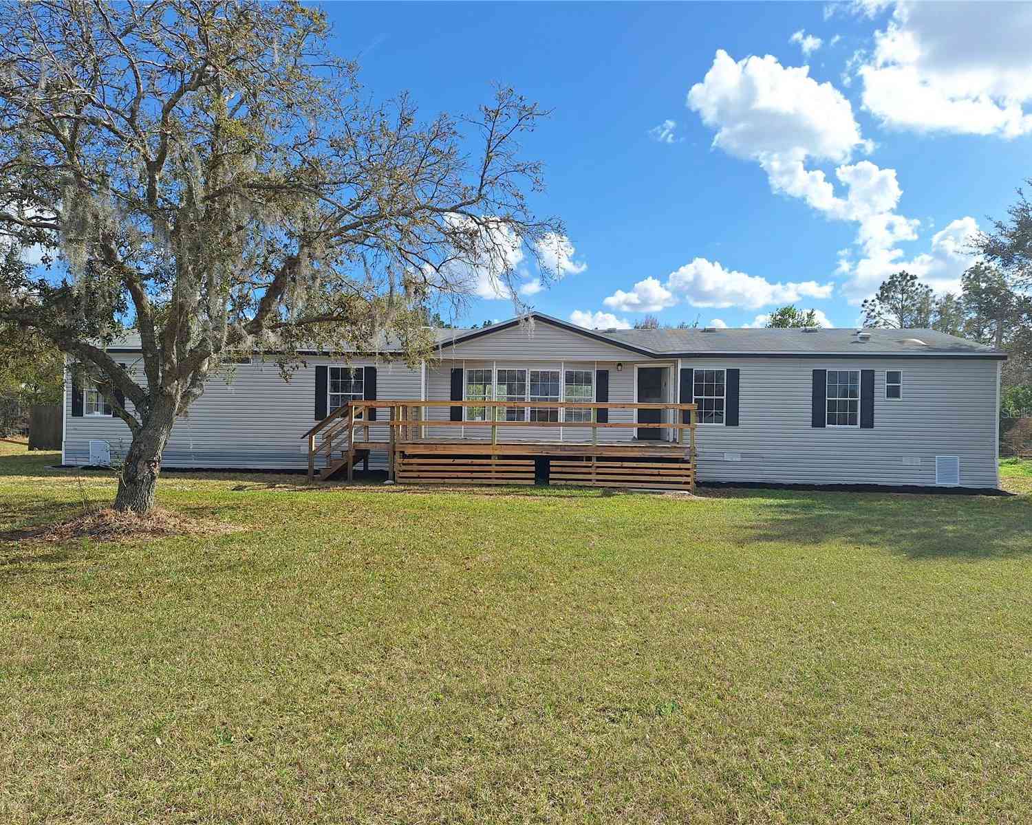 Mobile Home For Sale - 4452 Roundup Drive<br/> POLK CITY, FL 33868