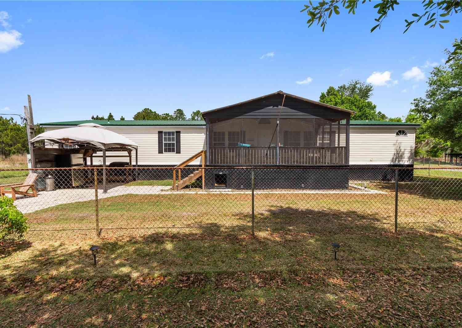 Mobile Home For Sale - 5051 Deen Still Road<br/> POLK CITY, FL 33868