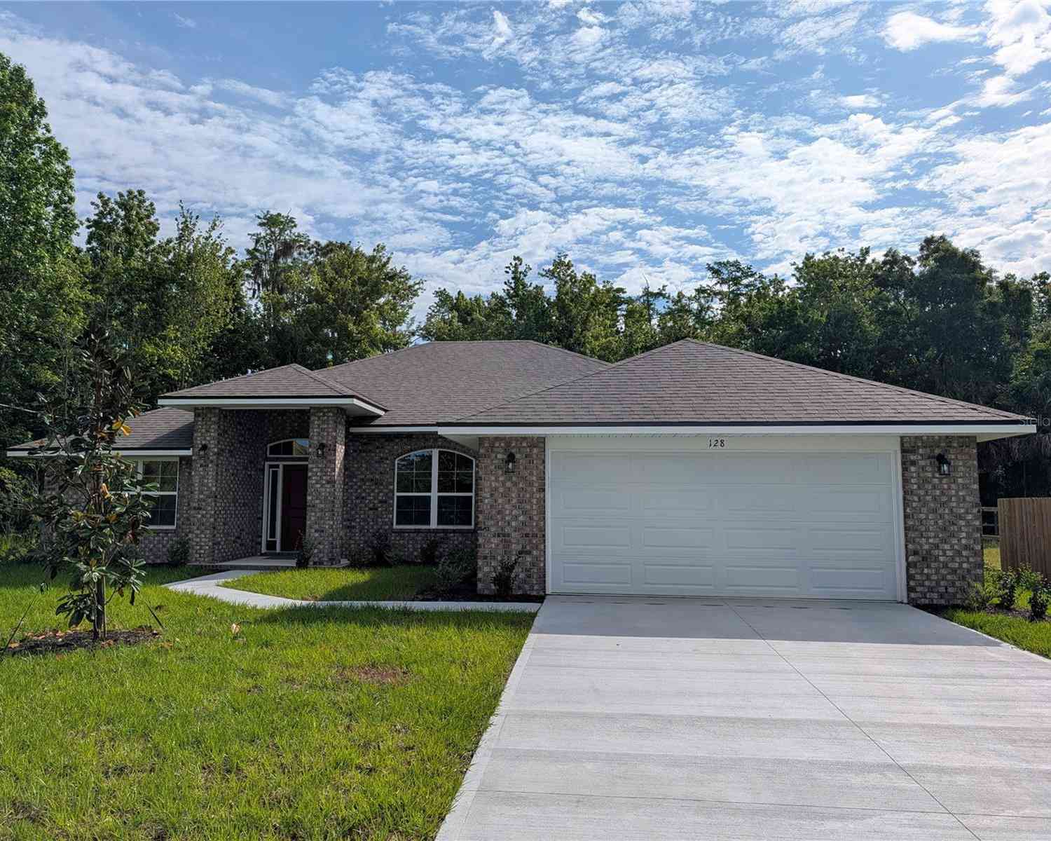 Homes For Sale - 128 Bird Of Paradise Drive<br/> PALM COAST, FL 32137