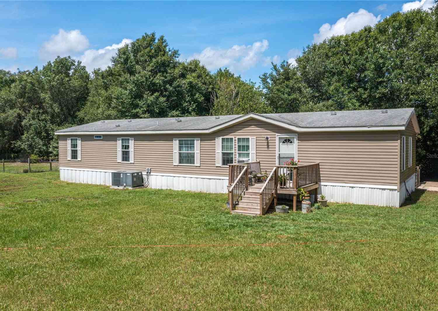 Mobile Home For Sale - 15079 Brahma Road<br/> POLK CITY, FL 33868